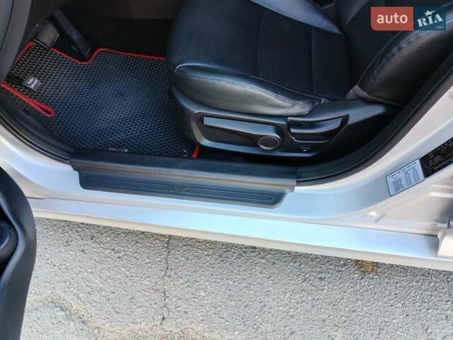 Серый Киа K5, объемом двигателя 2 л и пробегом 202 тыс. км за 12300 $, фото 11 на Automoto.ua