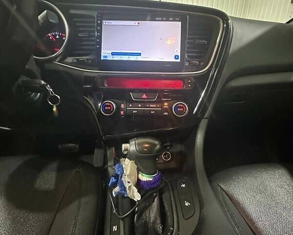 Серый Киа K5, объемом двигателя 2 л и пробегом 304 тыс. км за 8000 $, фото 11 на Automoto.ua