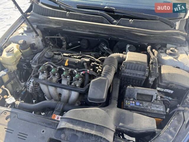 Серый Киа K5, объемом двигателя 2 л и пробегом 451 тыс. км за 7898 $, фото 38 на Automoto.ua