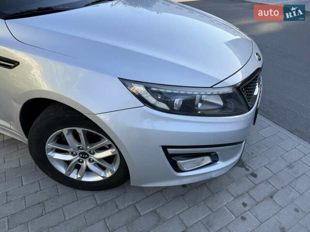 Серый Киа K5, объемом двигателя 2 л и пробегом 248 тыс. км за 9200 $, фото 3 на Automoto.ua