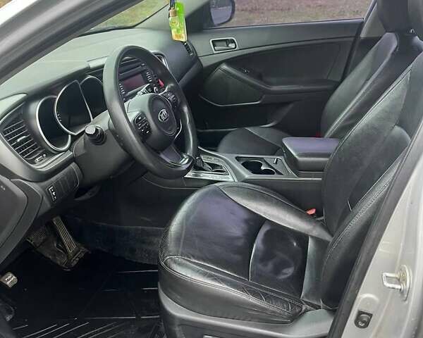 Серый Киа K5, объемом двигателя 2 л и пробегом 230 тыс. км за 8700 $, фото 4 на Automoto.ua