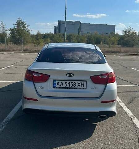 Серый Киа K5, объемом двигателя 2 л и пробегом 340 тыс. км за 8999 $, фото 2 на Automoto.ua