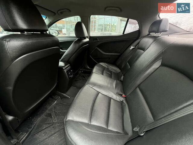 Серый Киа K5, объемом двигателя 2 л и пробегом 246 тыс. км за 7600 $, фото 20 на Automoto.ua