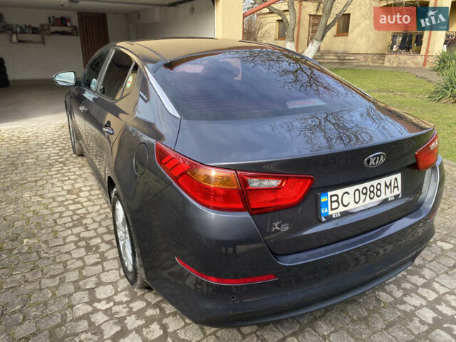Серый Киа K5, объемом двигателя 2 л и пробегом 208 тыс. км за 10550 $, фото 5 на Automoto.ua
