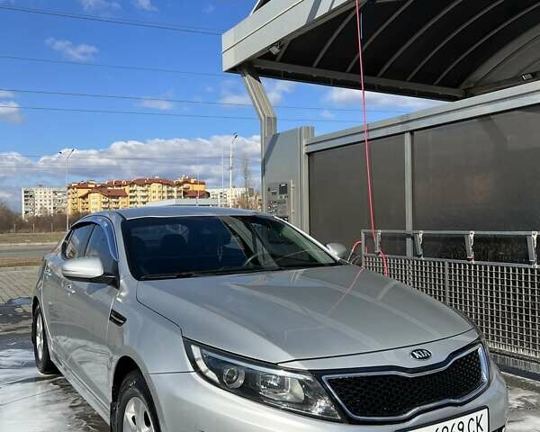 Серый Киа K5, объемом двигателя 2 л и пробегом 350 тыс. км за 8100 $, фото 13 на Automoto.ua