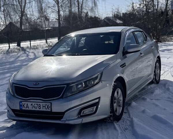 Серый Киа K5, объемом двигателя 2 л и пробегом 451 тыс. км за 7898 $, фото 2 на Automoto.ua