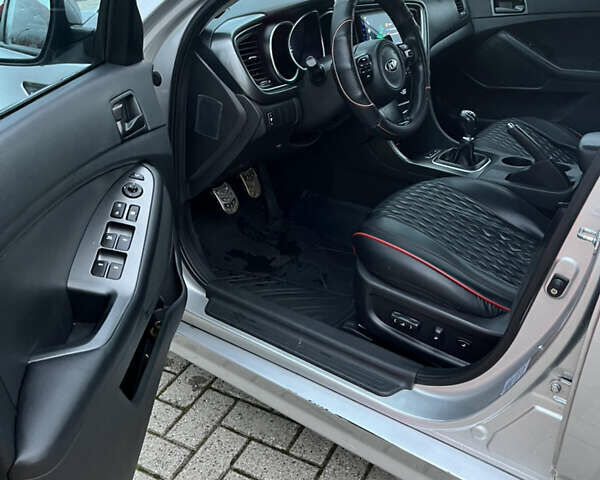 Серый Киа K5, объемом двигателя 2 л и пробегом 245 тыс. км за 9100 $, фото 13 на Automoto.ua