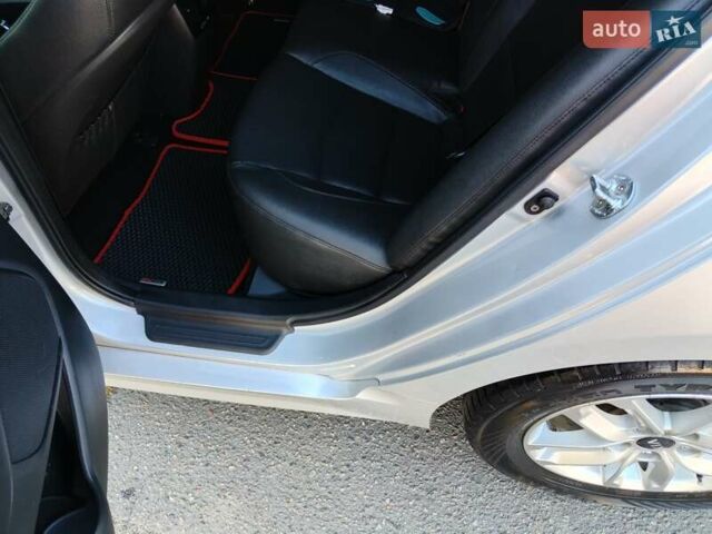 Серый Киа K5, объемом двигателя 2 л и пробегом 202 тыс. км за 12300 $, фото 10 на Automoto.ua