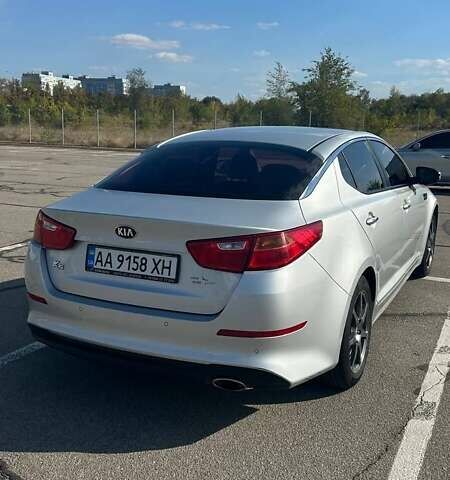 Серый Киа K5, объемом двигателя 2 л и пробегом 340 тыс. км за 8999 $, фото 6 на Automoto.ua