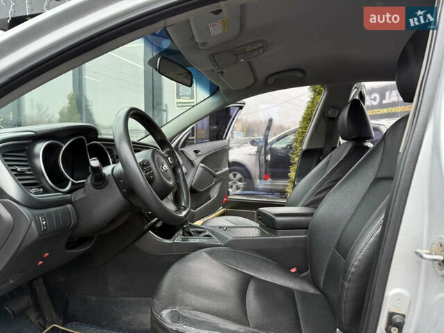 Серый Киа K5, объемом двигателя 2 л и пробегом 185 тыс. км за 8800 $, фото 11 на Automoto.ua