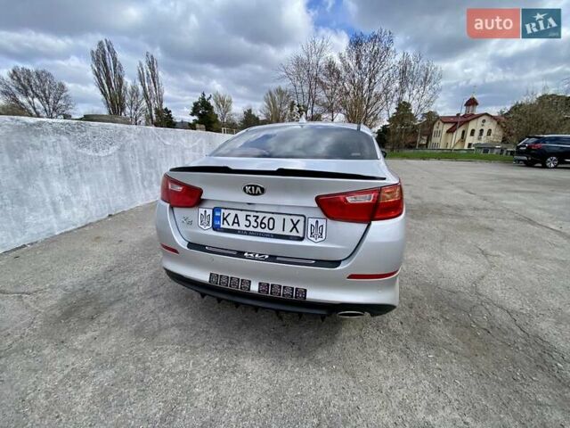 Серый Киа K5, объемом двигателя 2 л и пробегом 115 тыс. км за 10300 $, фото 4 на Automoto.ua