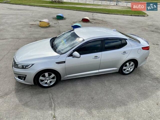 Серый Киа K5, объемом двигателя 2 л и пробегом 115 тыс. км за 10300 $, фото 9 на Automoto.ua