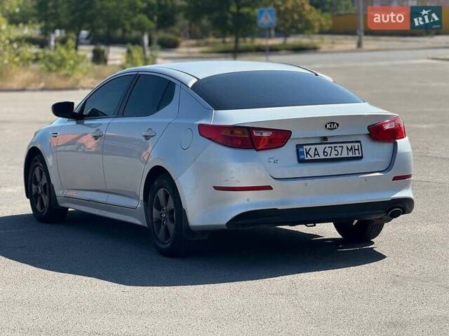 Серый Киа K5, объемом двигателя 2 л и пробегом 320 тыс. км за 8998 $, фото 3 на Automoto.ua