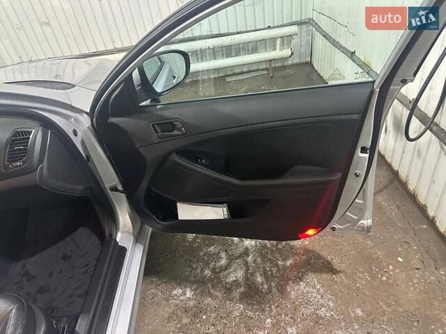 Серый Киа K5, объемом двигателя 2 л и пробегом 304 тыс. км за 8000 $, фото 29 на Automoto.ua