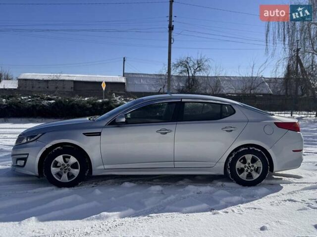 Серый Киа K5, объемом двигателя 2 л и пробегом 451 тыс. км за 7898 $, фото 4 на Automoto.ua