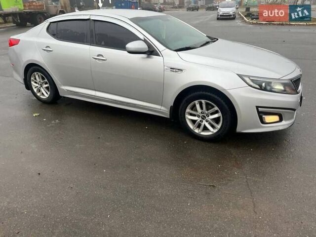 Серый Киа K5, объемом двигателя 2 л и пробегом 230 тыс. км за 8700 $, фото 2 на Automoto.ua