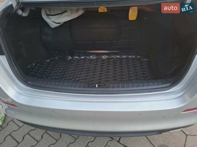 Серый Киа K5, объемом двигателя 2 л и пробегом 239 тыс. км за 12652 $, фото 8 на Automoto.ua