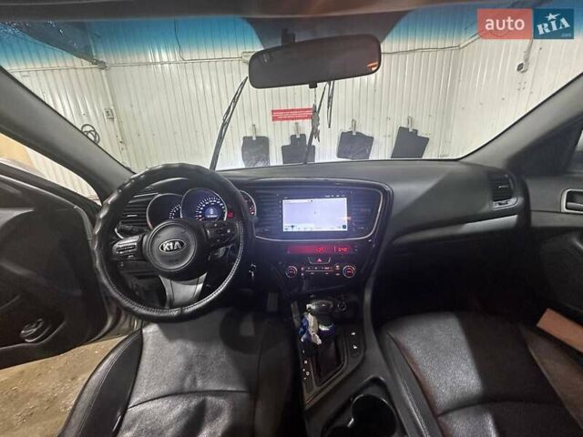 Серый Киа K5, объемом двигателя 2 л и пробегом 304 тыс. км за 8000 $, фото 14 на Automoto.ua