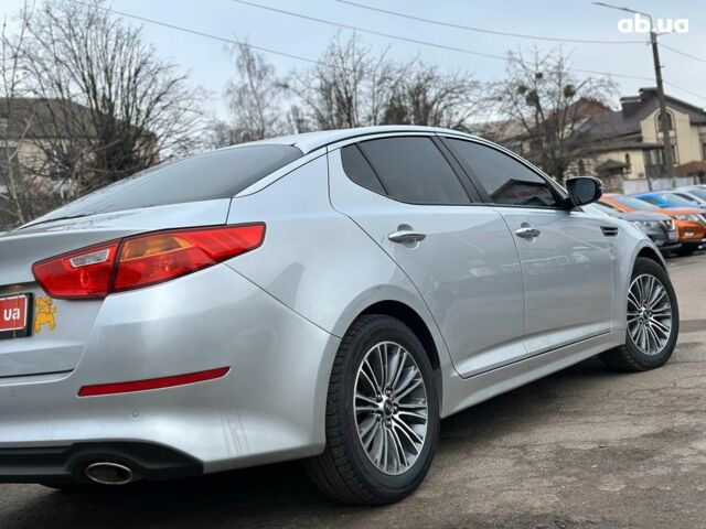 Серый Киа K5, объемом двигателя 2 л и пробегом 205 тыс. км за 10790 $, фото 6 на Automoto.ua