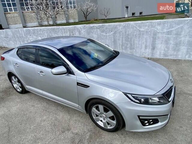Серый Киа K5, объемом двигателя 2 л и пробегом 115 тыс. км за 10300 $, фото 11 на Automoto.ua