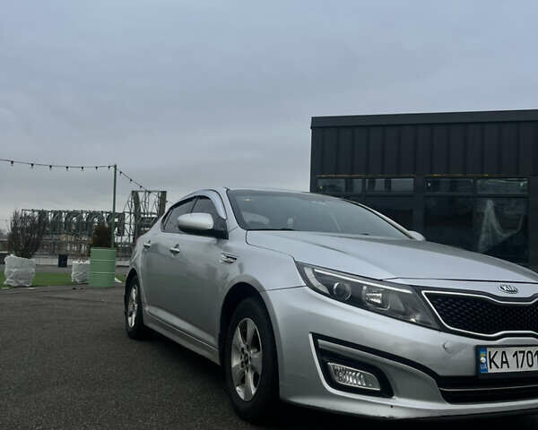 Серый Киа K5, объемом двигателя 2 л и пробегом 246 тыс. км за 7600 $, фото 1 на Automoto.ua