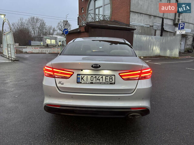 Серый Киа K5, объемом двигателя 2 л и пробегом 200 тыс. км за 11300 $, фото 4 на Automoto.ua