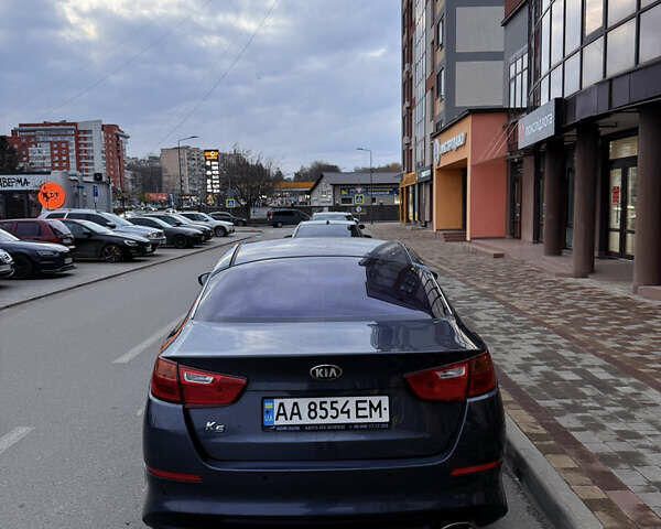 Серый Киа K5, объемом двигателя 2 л и пробегом 240 тыс. км за 11400 $, фото 3 на Automoto.ua