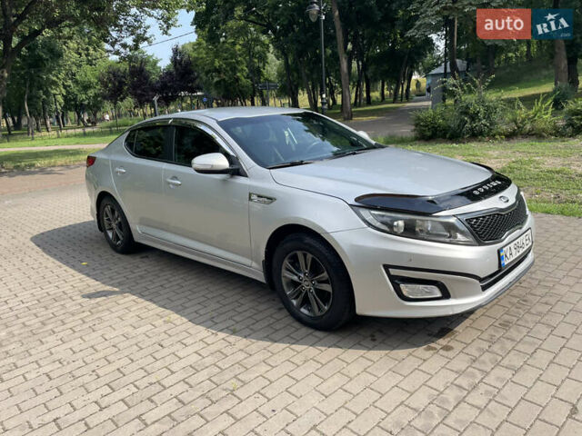 Серый Киа K5, объемом двигателя 2 л и пробегом 236 тыс. км за 10500 $, фото 3 на Automoto.ua