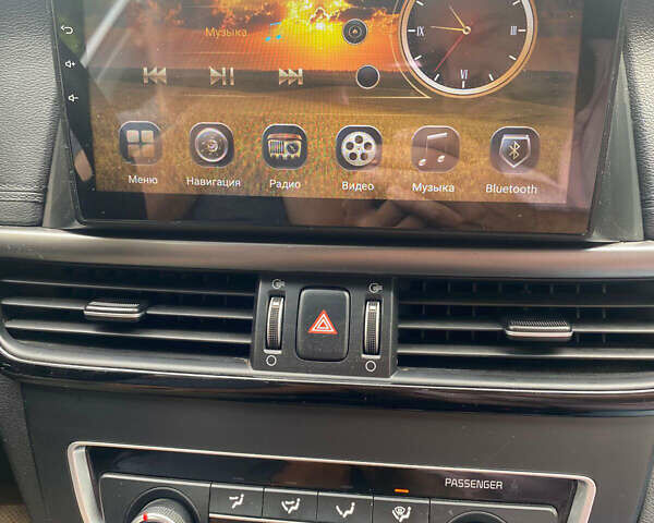 Серый Киа K5, объемом двигателя 2 л и пробегом 338 тыс. км за 12000 $, фото 13 на Automoto.ua