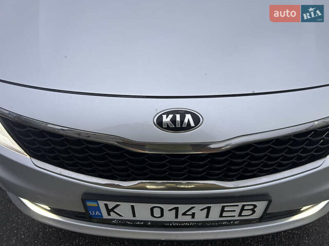 Серый Киа K5, объемом двигателя 2 л и пробегом 200 тыс. км за 11300 $, фото 7 на Automoto.ua