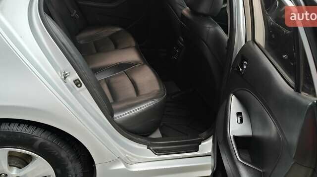 Серый Киа K5, объемом двигателя 2 л и пробегом 270 тыс. км за 8800 $, фото 15 на Automoto.ua