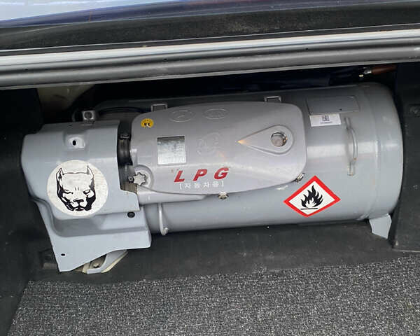 Серый Киа K5, объемом двигателя 2 л и пробегом 350 тыс. км за 10300 $, фото 15 на Automoto.ua