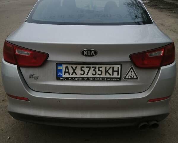 Серый Киа K5, объемом двигателя 2 л и пробегом 257 тыс. км за 8500 $, фото 2 на Automoto.ua