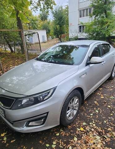 Серый Киа K5, объемом двигателя 2 л и пробегом 207 тыс. км за 8500 $, фото 3 на Automoto.ua