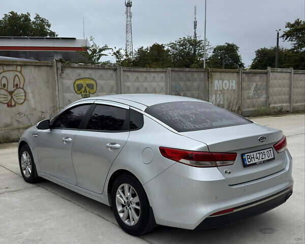 Серый Киа K5, объемом двигателя 2 л и пробегом 280 тыс. км за 11500 $, фото 7 на Automoto.ua