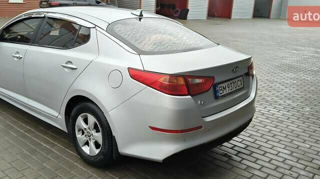 Серый Киа K5, объемом двигателя 2 л и пробегом 270 тыс. км за 8800 $, фото 4 на Automoto.ua