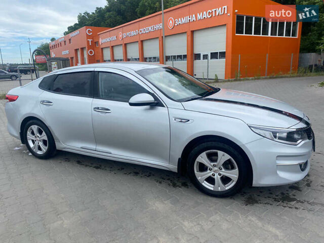 Серый Киа K5, объемом двигателя 2 л и пробегом 338 тыс. км за 12000 $, фото 4 на Automoto.ua