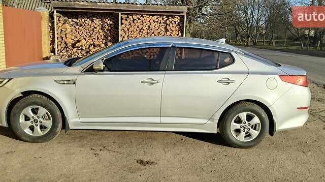 Серый Киа K5, объемом двигателя 2 л и пробегом 270 тыс. км за 8900 $, фото 3 на Automoto.ua