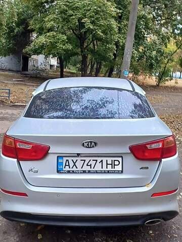 Серый Киа K5, объемом двигателя 2 л и пробегом 207 тыс. км за 8500 $, фото 1 на Automoto.ua
