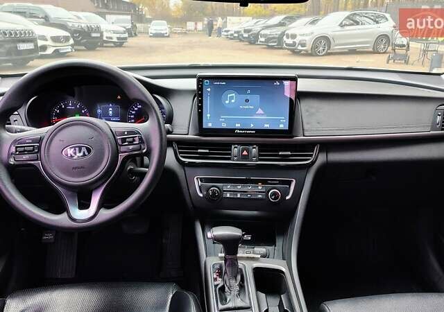 Серый Киа K5, объемом двигателя 2 л и пробегом 314 тыс. км за 10000 $, фото 13 на Automoto.ua