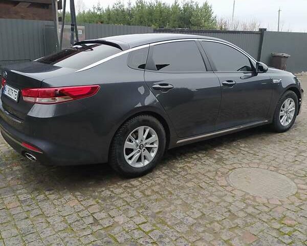 Сірий Кіа K5, об'ємом двигуна 2 л та пробігом 234 тис. км за 12750 $, фото 4 на Automoto.ua