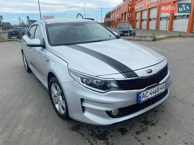 Серый Киа K5, объемом двигателя 2 л и пробегом 338 тыс. км за 12000 $, фото 1 на Automoto.ua