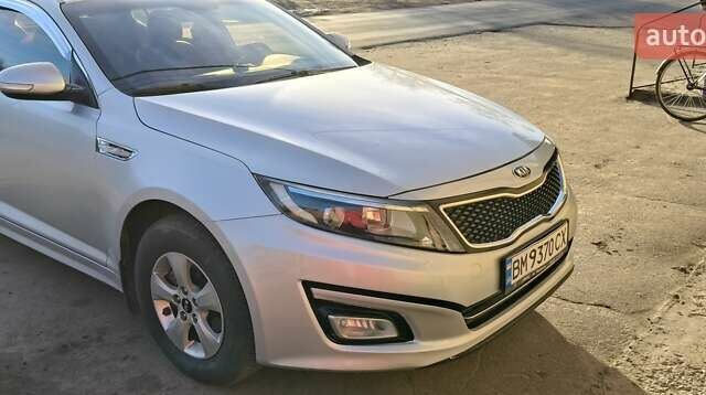 Серый Киа K5, объемом двигателя 2 л и пробегом 270 тыс. км за 8900 $, фото 1 на Automoto.ua