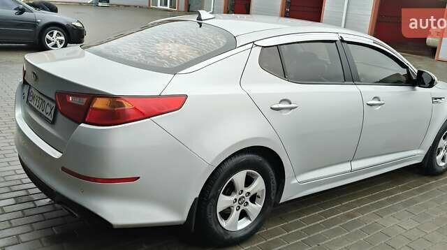 Серый Киа K5, объемом двигателя 2 л и пробегом 270 тыс. км за 8800 $, фото 3 на Automoto.ua