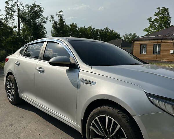 Серый Киа K5, объемом двигателя 2 л и пробегом 215 тыс. км за 11500 $, фото 4 на Automoto.ua