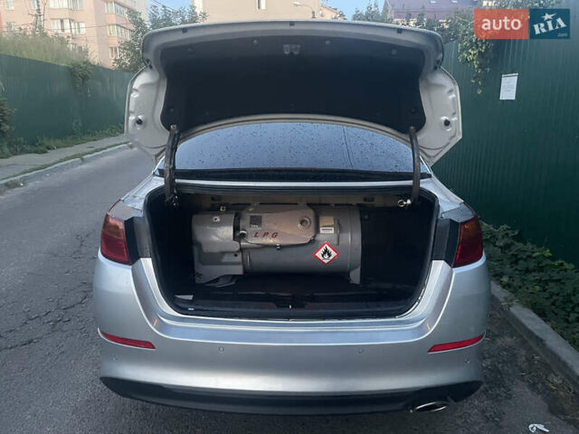 Серый Киа K5, объемом двигателя 0 л и пробегом 335 тыс. км за 9250 $, фото 11 на Automoto.ua