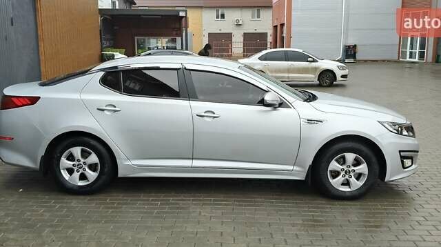 Серый Киа K5, объемом двигателя 2 л и пробегом 270 тыс. км за 8800 $, фото 2 на Automoto.ua