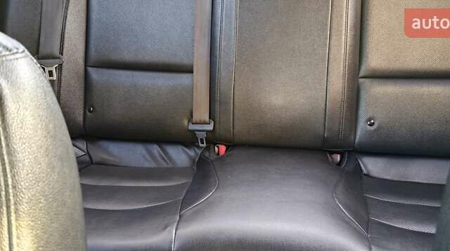 Серый Киа K5, объемом двигателя 2 л и пробегом 270 тыс. км за 8900 $, фото 6 на Automoto.ua