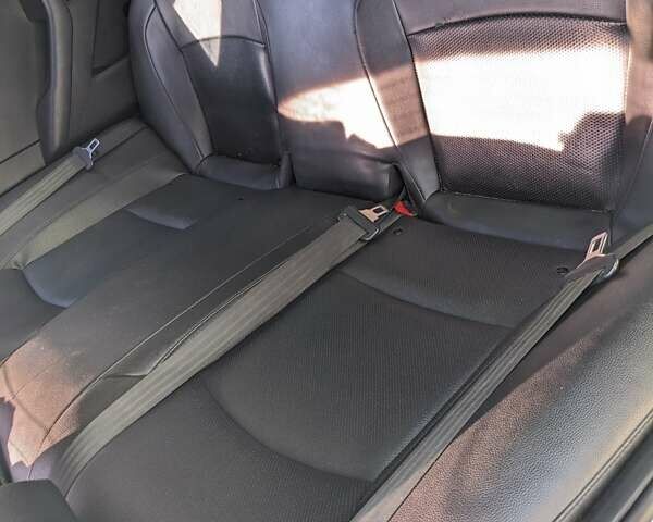 Серый Киа K5, объемом двигателя 2 л и пробегом 306 тыс. км за 9900 $, фото 5 на Automoto.ua