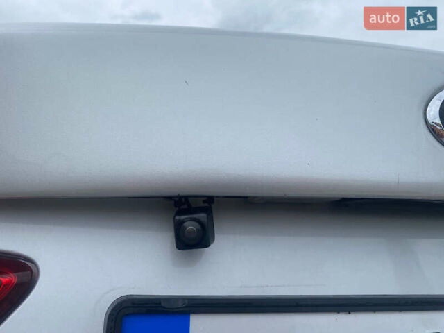 Серый Киа K5, объемом двигателя 2 л и пробегом 338 тыс. км за 12000 $, фото 11 на Automoto.ua